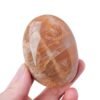 2 Sizes of Orange Moonstone Crystal Palm Stone Wholesale 121010000