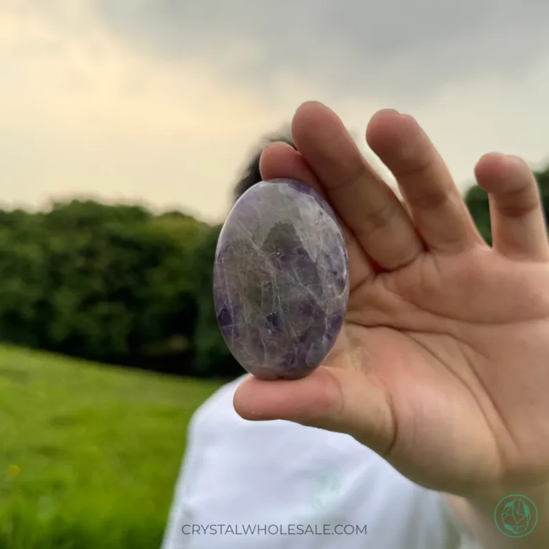 Carry an amethyst palm stone with you