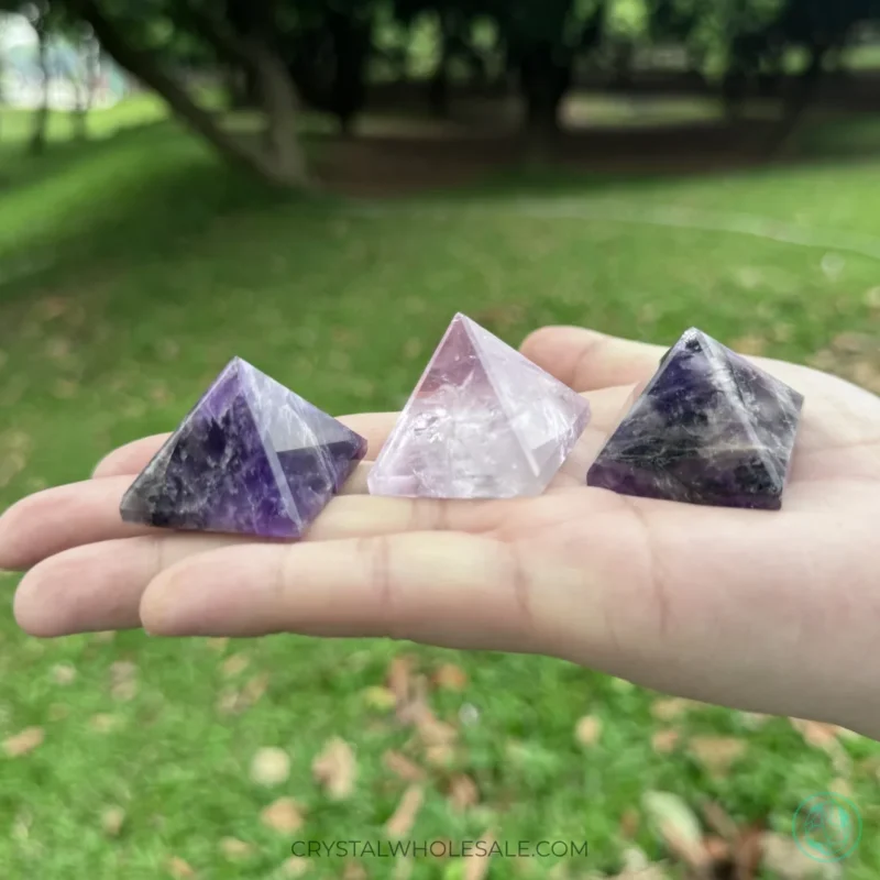 Three amethyst energy pyramids